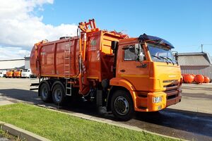 мусоровоз КО-440-5 (вместимость кузова 22м3, боковая загрузка, универсальный захват)