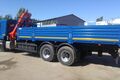 Бортовой КАМАЗ 65117-3010-48 с КМУ Fassi 215A.0.24